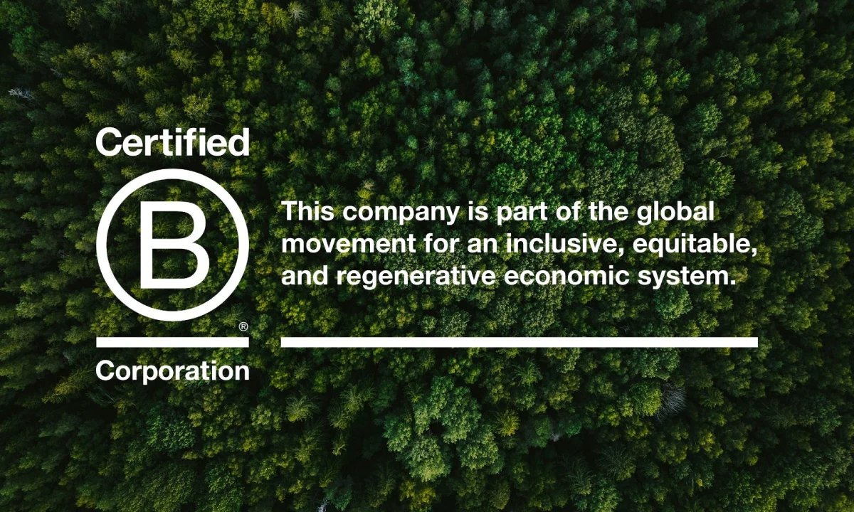 Certified B Corporation logo, bold white B in a circle on a dense forest aerial backdrop.